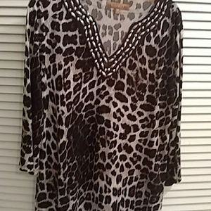 Ladies Ellen Tracy top size medium animal print.